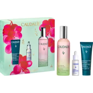 Caudalie skincare gift set with beauty elixir, serum, and detox mask.
