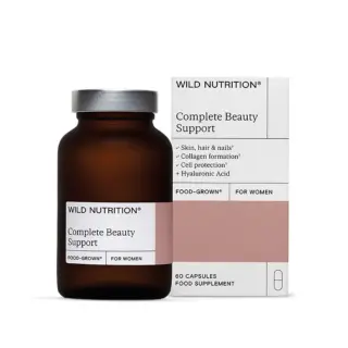 Brown bottle and box of Wild Nutrition Complete Beauty Support capsules for women.