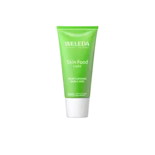 Green tube of Weleda Skin Food Light moisturising skincare.