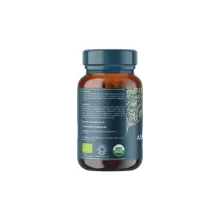 Brown bottle with blue label, organic certification logos, and contact details for Ayurvedic company.