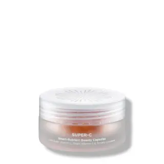 Super-C beauty capsules in a frosted jar with white lid and text detailing ingredients.