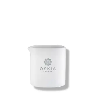 White ceramic jug with "OSKIA LONDON" logo on the front.