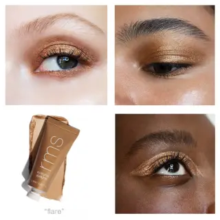 Four eyes with gold eyeshadow and a tube of RMS Eyelights in "flare".