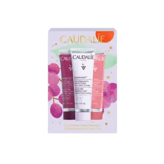 Caudalie hand cream trio with grape design packaging.