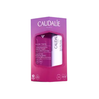 Caudalie gift set with hand cream and lip balm in purple packaging.