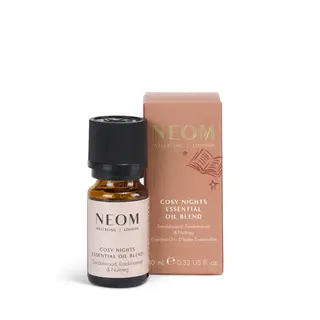Neom Cosy Nights Essential Oil Blend with sandalwood, frankincense, and nutmeg. 10 ml bottle.