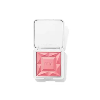 Open compact with pink blush and "rms" embossed on the surface.