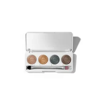 Makeup palette with four eyeshadows and a brush in a white case.