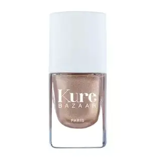 Kure Bazaar Paris nail polish in metallic bronze shade with white cap.