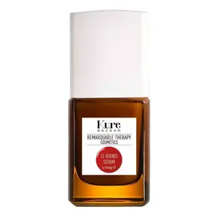 Kure Bazaar Le Vernis Serum bottle with white cap and brown glass.