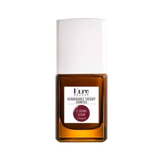 Kure Bazaar Le Vernis Sérum, Le Rouge 02, in a brown bottle with a white cap.