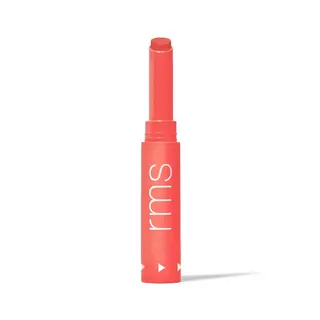 Coral lipstick in a tube with "rms" text on the side.
