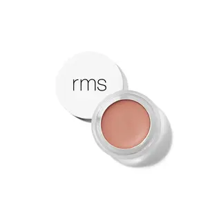 Open jar of peach-coloured cream with "rms" on the lid.