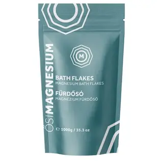Teal packet of magnesium bath flakes, 1000g, with white geometric design.