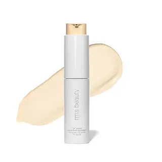 RMS Beauty foundation bottle with beige liquid swatch behind.