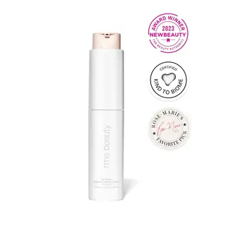 White RMS Beauty primer bottle with award and certification badges.
