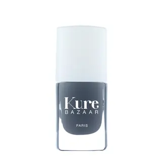 Kure Bazaar grey nail polish bottle with white cap.
