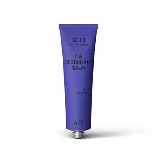 Purple tube labelled "The Deodorant Balm" by AKT, scent: Vetiver, Lavandin, Yuzu.