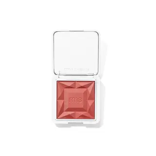Open compact with red blush and "rms beauty" embossed on the lid.