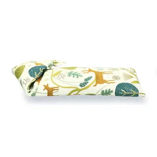 Cream eye pillow with deer and leaf pattern in green and brown.