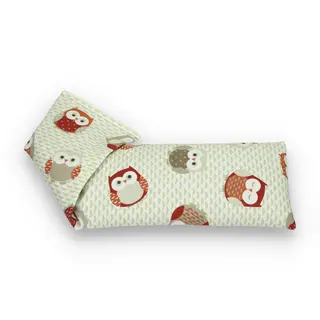 Cream eye pillow with red and brown owl pattern.
