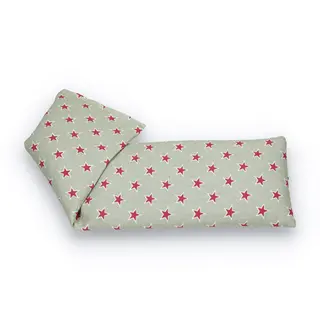 Grey eye pillow with red star pattern, folded at one end.