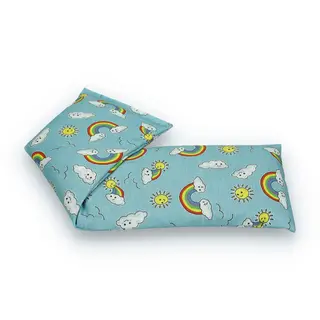 Blue fabric with rainbows, clouds, and sun pattern on a rectangular cushion.