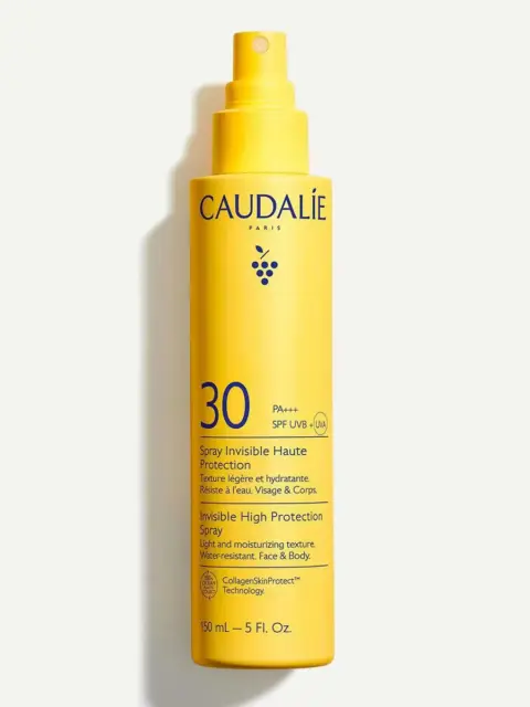 Yellow bottle of Caudalie SPF 30 spray, 150 mL, with UVA/UVB protection.