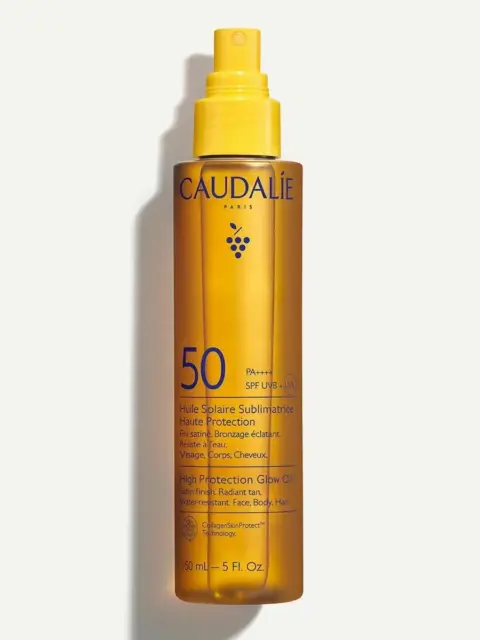 Caudalie SPF 50 High Protection Glow Oil, 150ml bottle, yellow spray cap.