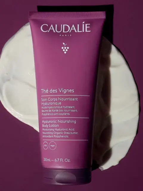 Caudalie Thé des Vignes Hyaluronic Nourishing Body Lotion, 200ml, on purple background.