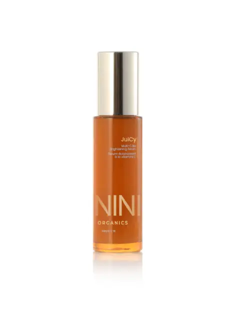 NINI Organics Juicy Multi-C Bio Brightening Serum, 50ml bottle with gold cap.