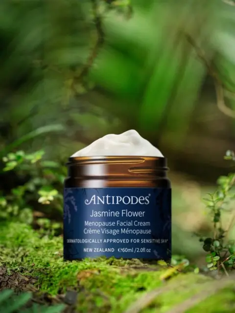Antipodes Jasmine Flower Menopause Facial Cream in a forest setting.