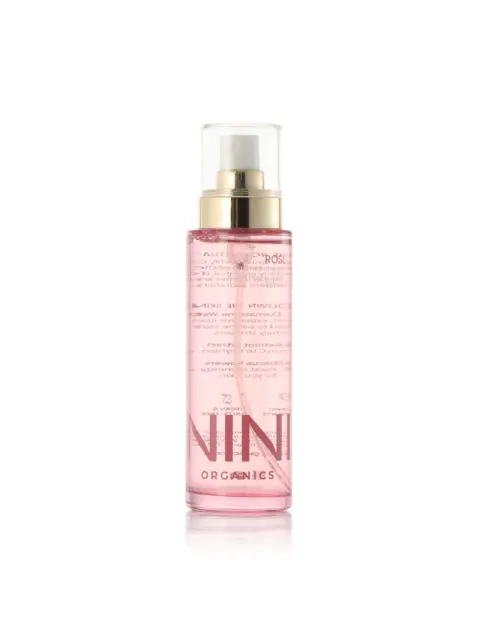 Pink spray bottle with gold cap, labelled "NINI Organics".