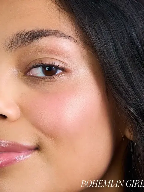 Close-up of a woman's face with smooth skin and text "BOHEMIAN GIRL" in the corner.