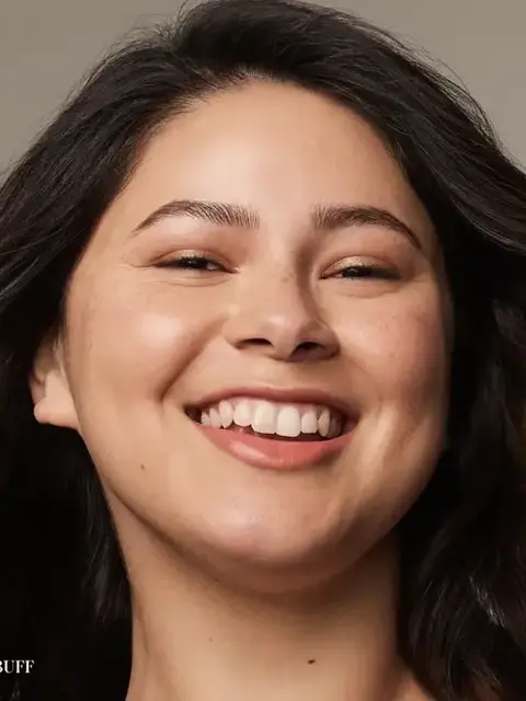 Smiling person with clear skin, dark hair, and text "BUFF" in the corner.