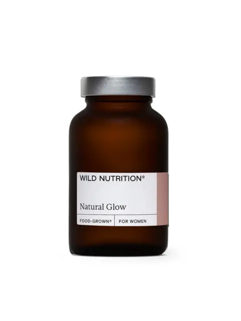 Brown jar labelled "Wild Nutrition Natural Glow, Food-Grown for Women".