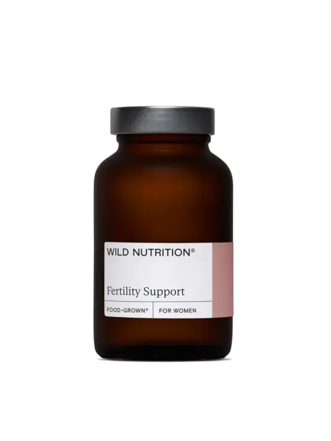 Brown bottle labelled "Wild Nutrition Fertility Support".
