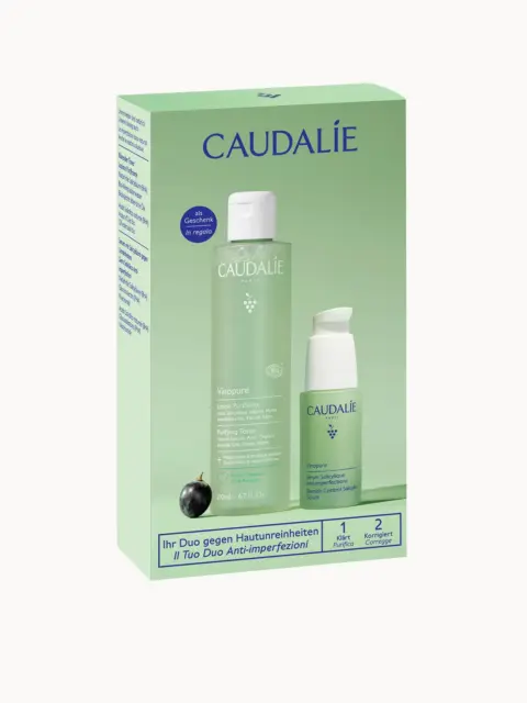 Caudalie Vinopure skincare set with purifying toner and serum in green packaging.