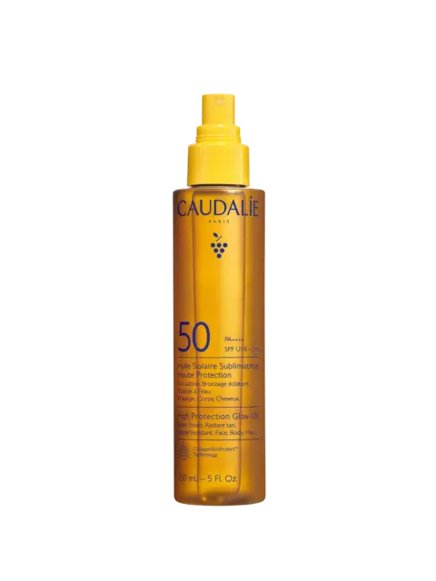 Caudalie SPF 50 glow oil spray bottle, 150ml, yellow with blue text.
