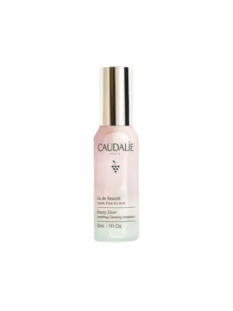 Caudalie Beauty Elixir bottle, 30ml, with silver cap and grape logo.