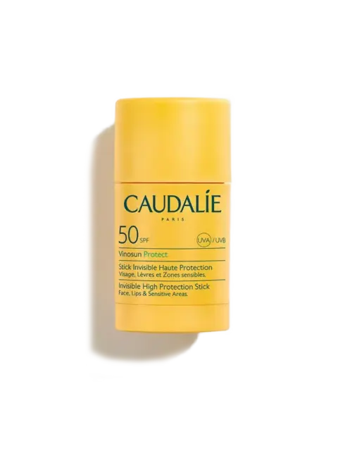 Yellow Caudalie SPF 50 stick for face, lips, and sensitive areas. UVA/UVB protection.
