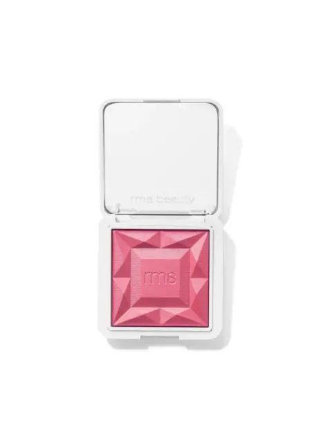 Pink blush compact with embossed geometric design and "rms" logo.