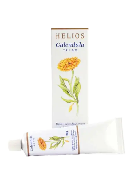 Helios Calendula Cream box and tube with flower illustration.