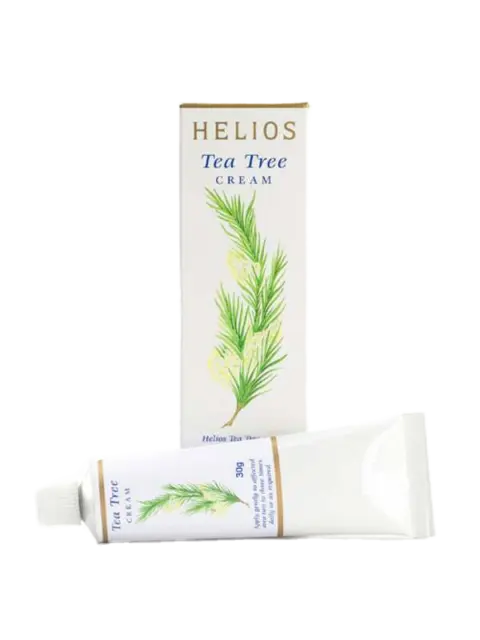 Helios Tea Tree Cream box and tube, 30g, with green leaf design.