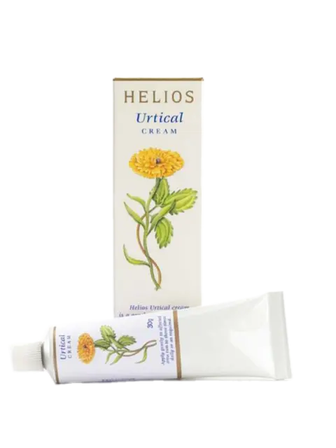 Helios Urtical Cream box and tube with yellow flower illustration.