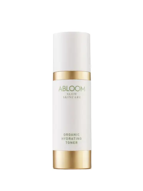 Abloom Slow Skincare Organic Hydrating Toner in a white and gold bottle.