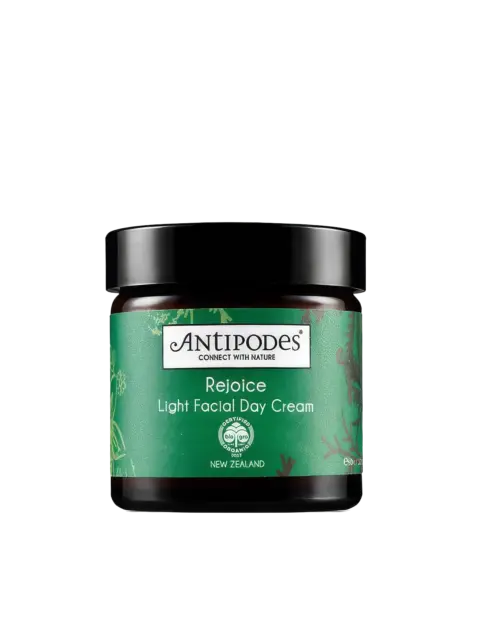 Antipodes Rejoice Light Facial Day Cream jar with green label.