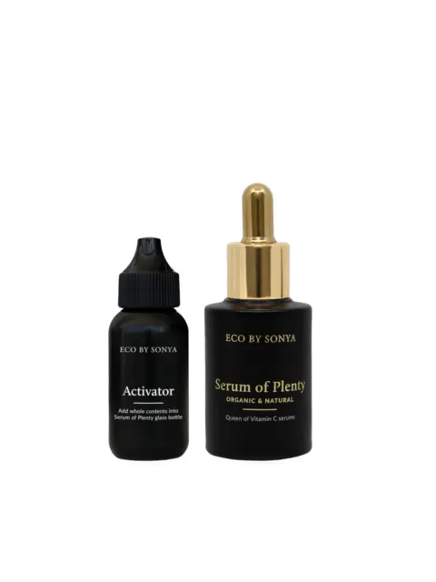 Two black bottles of Eco by Sonya skincare products, labelled Activator and Serum of Plenty.