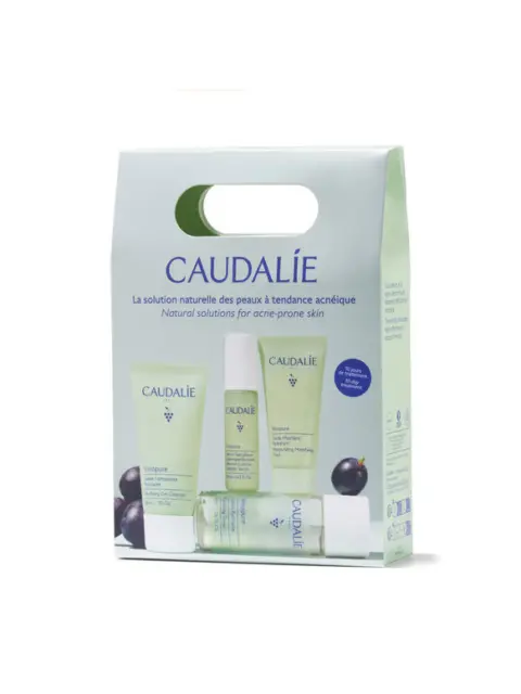 Caudalie skincare set for acne-prone skin, includes cleanser, serum, and moisturiser.