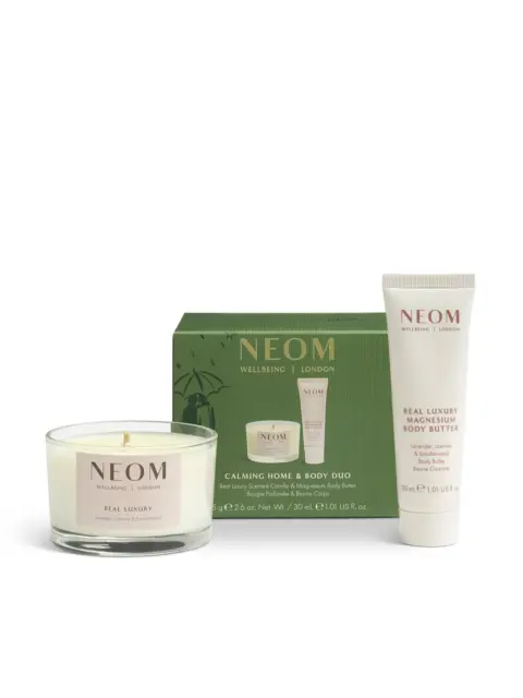 NEOM Calming Home & Body Duo with candle and body butter in green packaging.